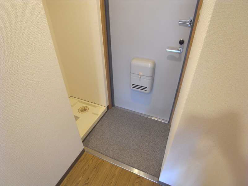 コンチネンタル秀峰 玄関