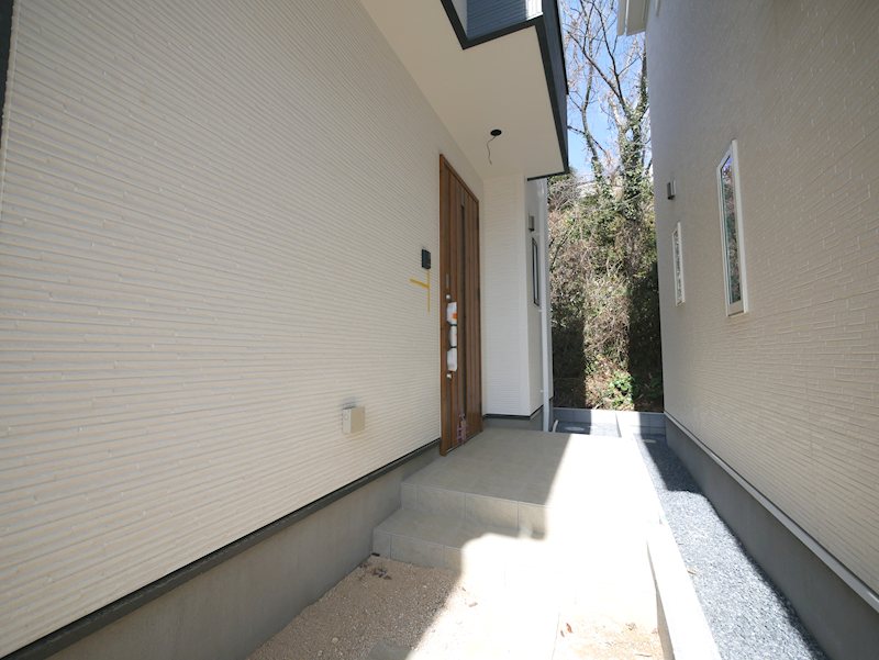 西成沢町２丁目　１１号棟 現地写真（玄関）