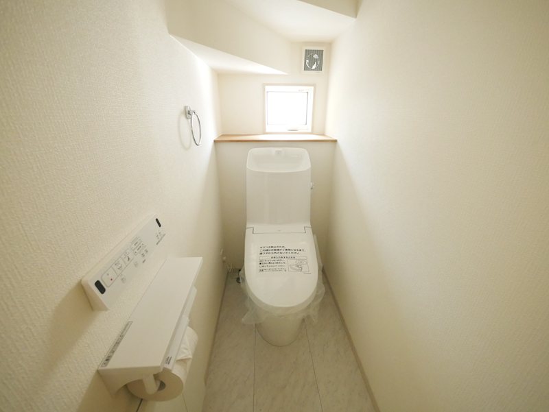 西成沢町２丁目　１２号棟 内観写真（トイレ）