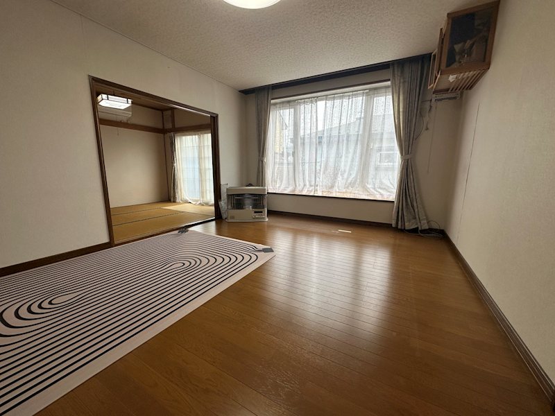 美幌町字稲美８８番　戸建て 内観写真（リビング）