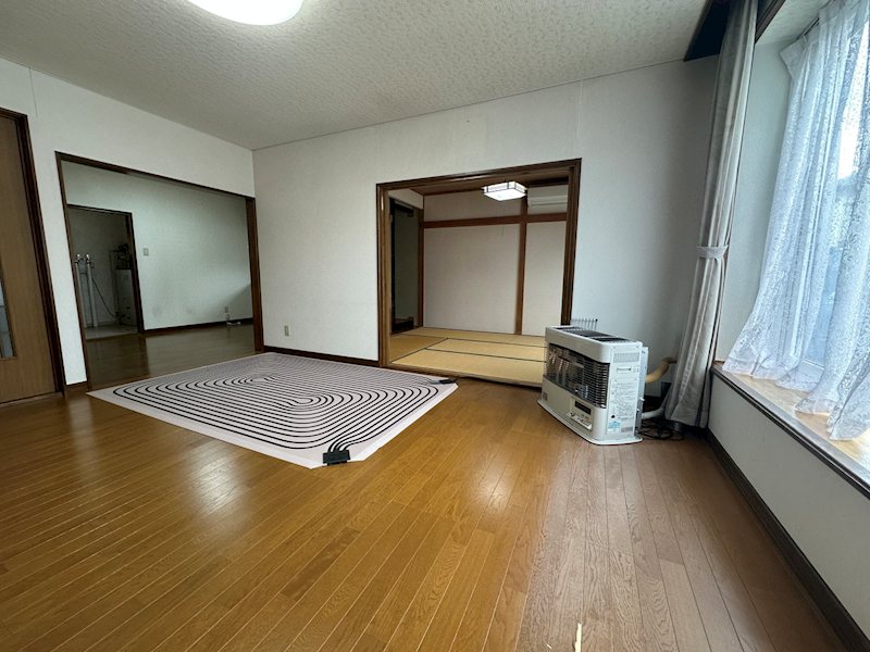 美幌町字稲美８８番　戸建て 内観写真（リビング）