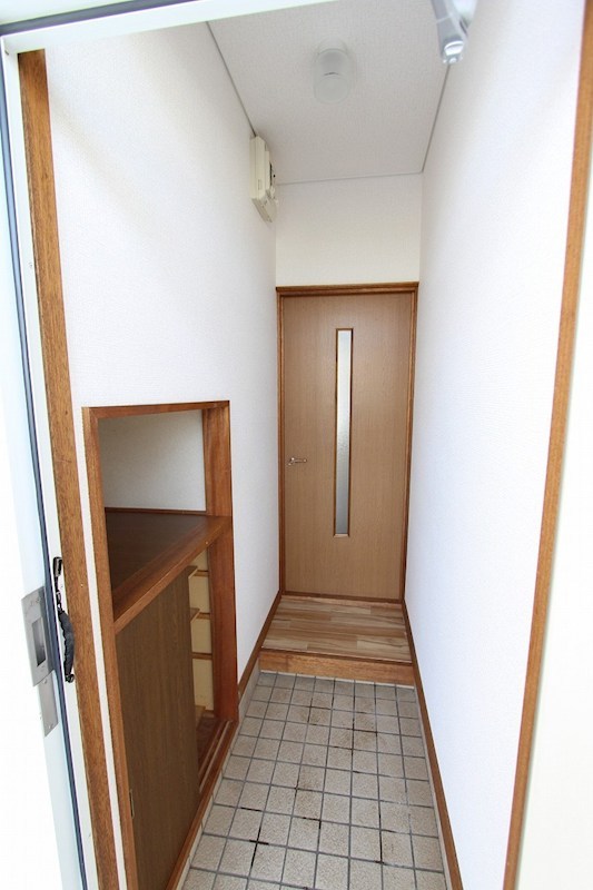 美幌町字東町１丁目７番　共同住宅 現地写真（玄関）