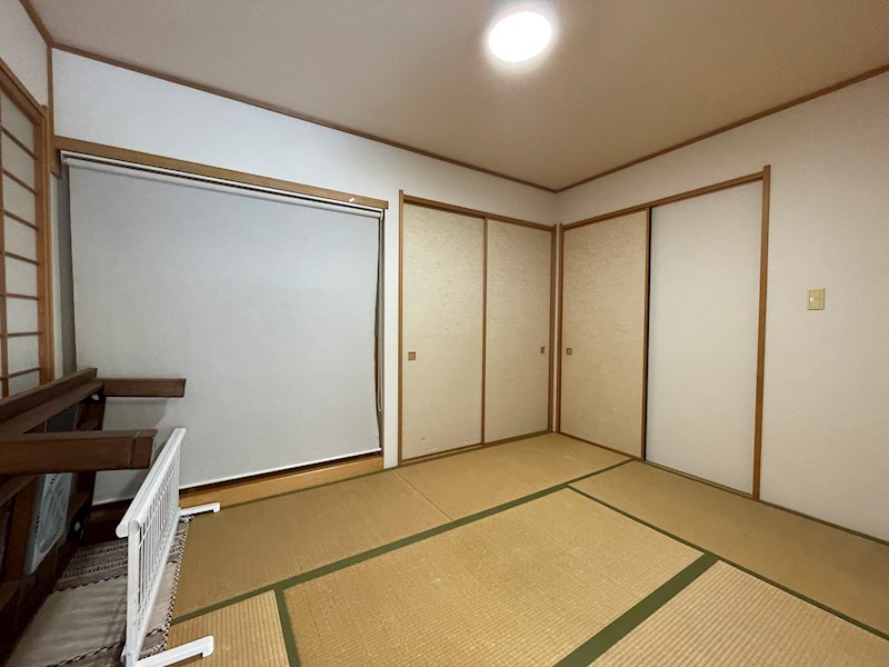 貫弥生が丘三丁目12番戸建 内観写真（リビング以外の居室）