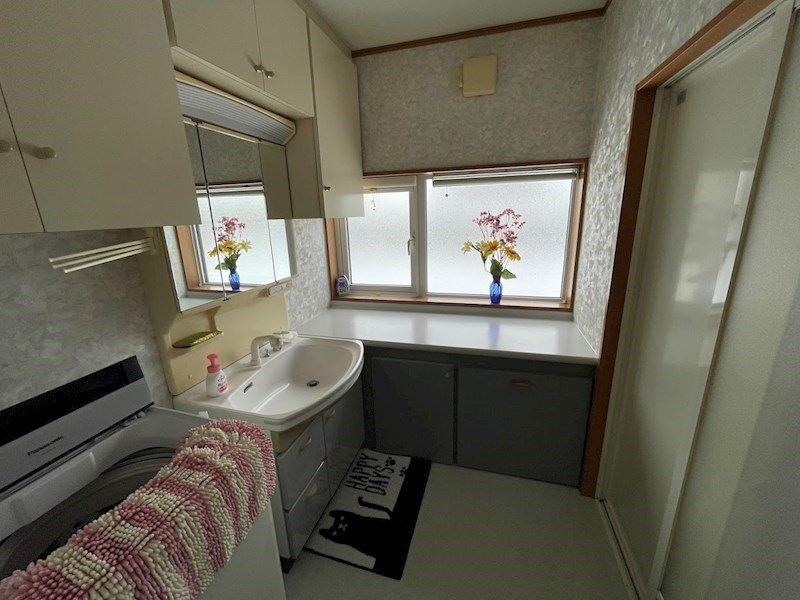 5635　上北郡おいらせ町新敷　中古住宅 内観写真（洗面台・洗面所）