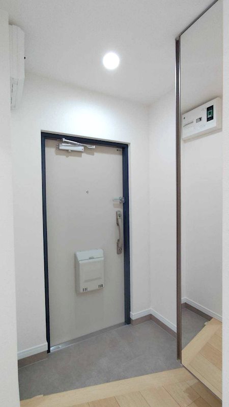 高洲一丁目住宅 現地写真（玄関）