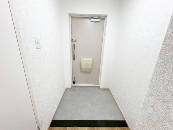 ユニハイム平野北 現地写真（玄関）