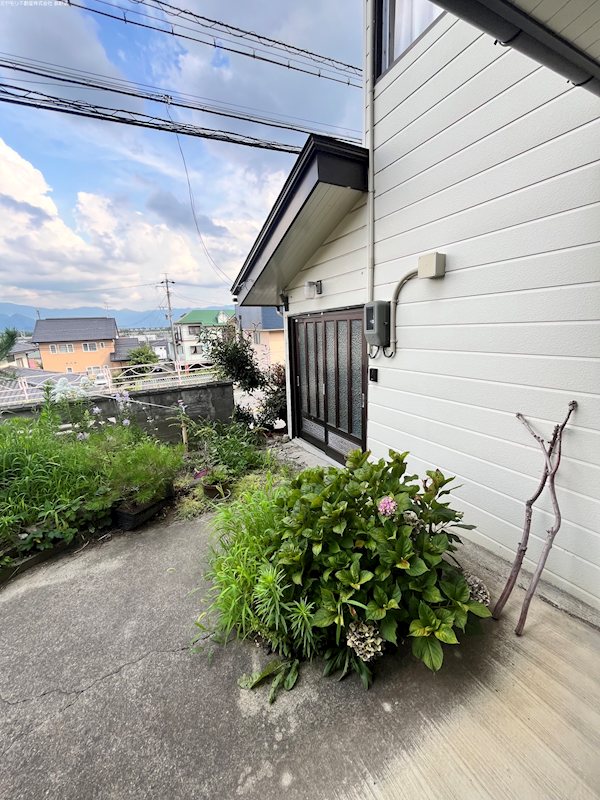 長野県長野市安茂里小市１丁目 現地写真（玄関）
