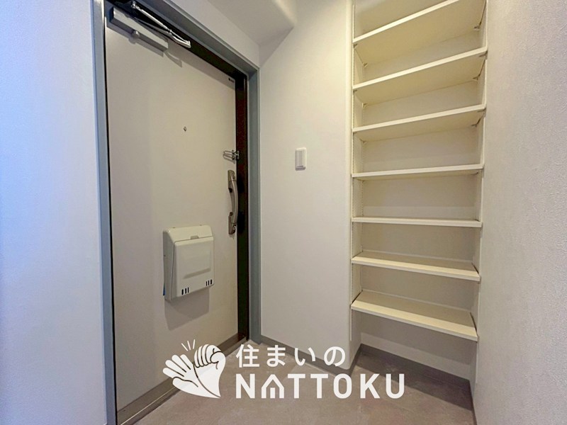 ガーデンハイツ香里ケ丘Ⅰ 現地写真（玄関）
