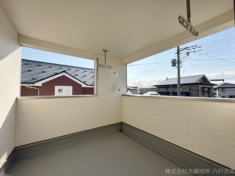 八戸市江陽第8　3号棟 現地写真（バルコニー）