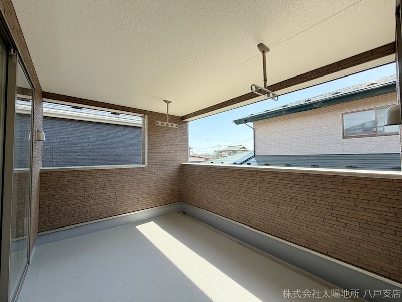 八戸市石堂第11　2号棟 現地写真（バルコニー）