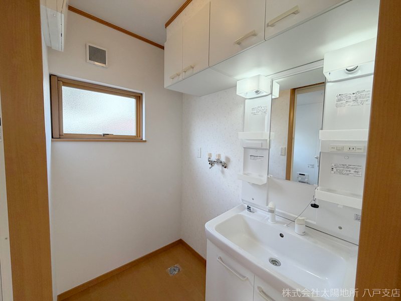 八戸市南白山台二丁目　中古戸建 内観写真（洗面台・洗面所）