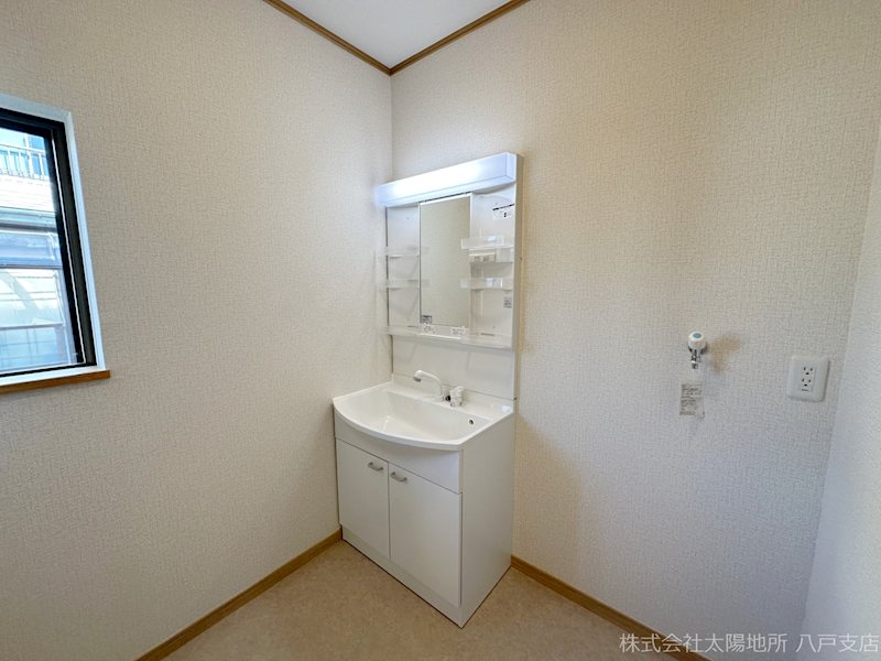 上北郡六戸町小松ケ丘4丁目　中古戸建 内観写真（洗面台・洗面所）