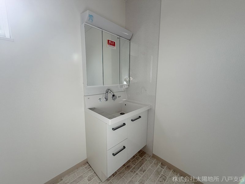 八戸市大字白銀町字白浜道　中古戸建（未入居） 内観写真（洗面台・洗面所）