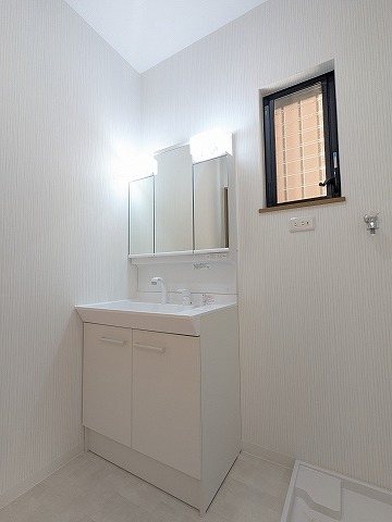 大阪府枚方市松丘町 内観写真（洗面台・洗面所）