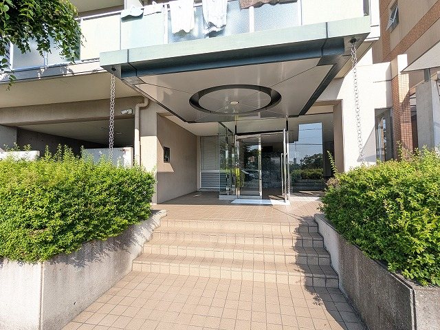 大阪府枚方市田口山２丁目 共用部写真（エントランス）