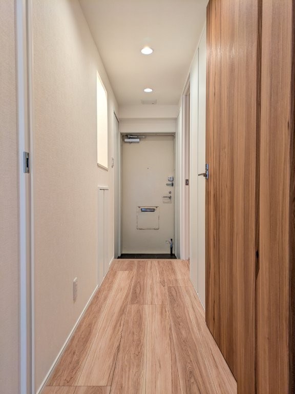 月島ホームズ 現地写真（玄関）