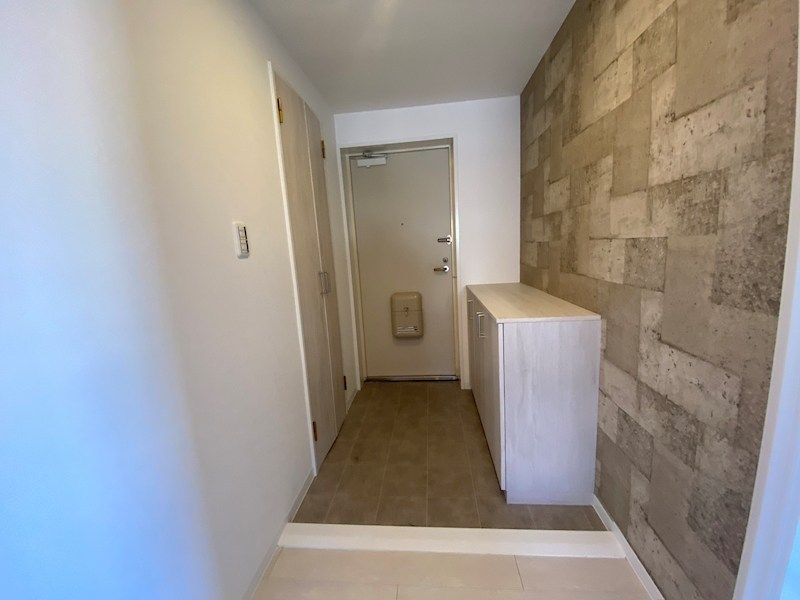 下駄箱も新調交換、玄関ホール ひらかた北山アミタス9号棟 その他