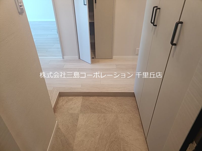 メゾン千里丘T棟  現地写真（玄関）