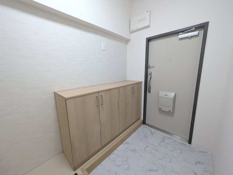 グリーンタウン香里ケ丘A棟 現地写真（玄関）